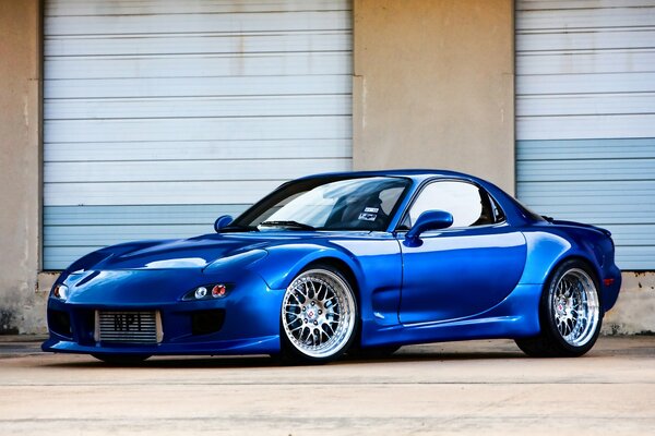 Tuned mazda rx-7 in blue