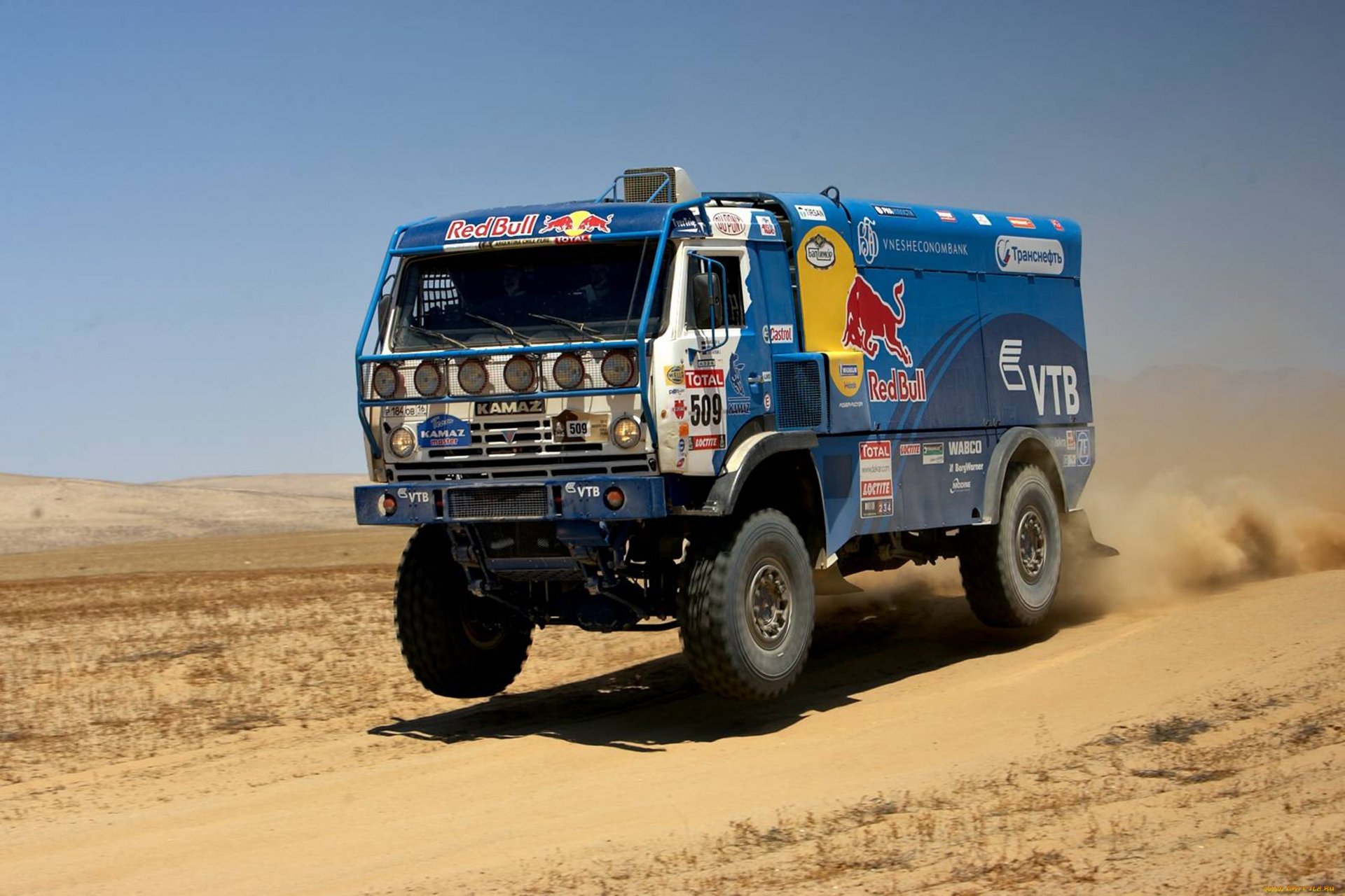 kamaz ciężarówka rajd dakar przód czerwony byk reflektory stopklatka prędkość moc