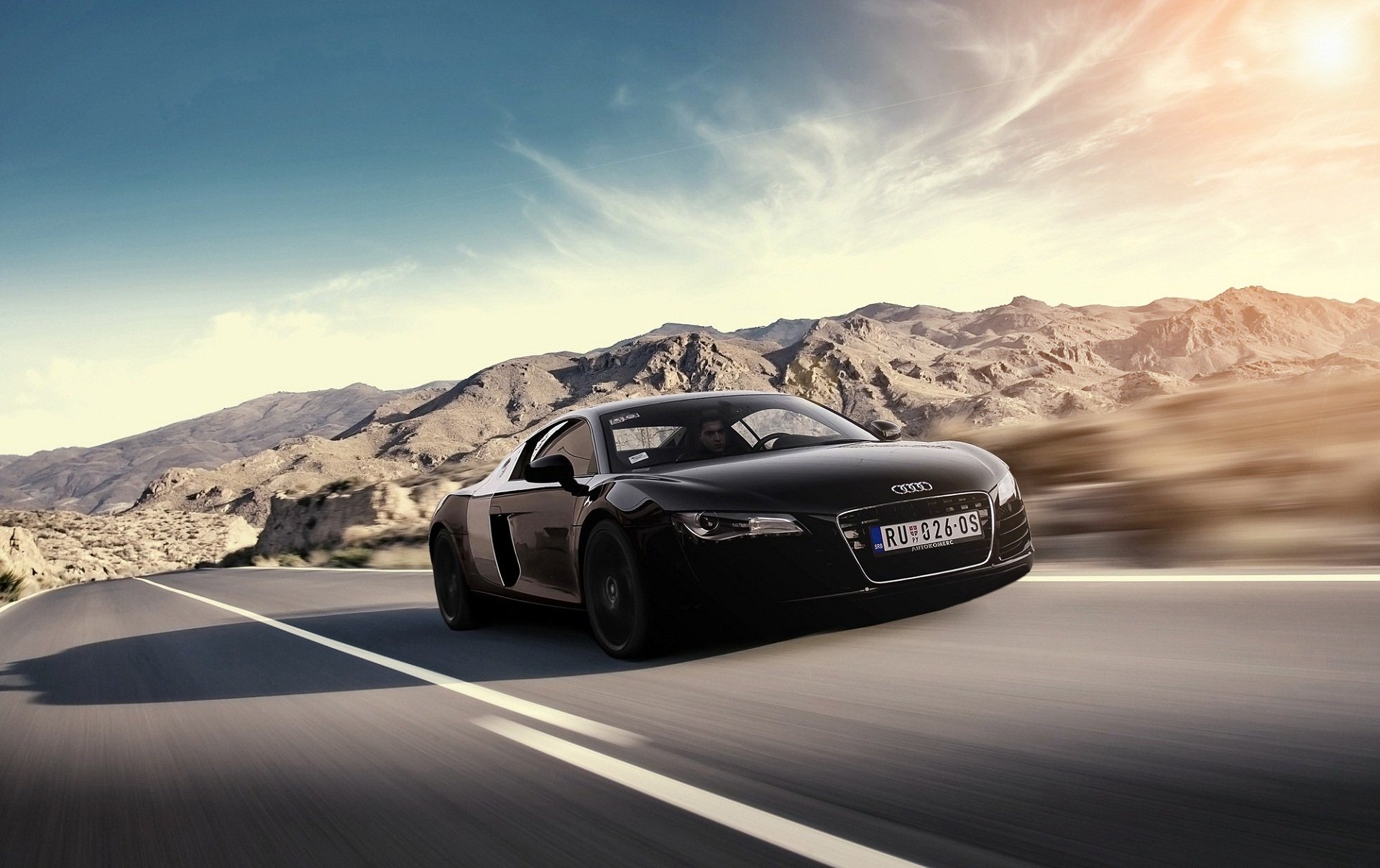 audi r8 negro frente audi montaña velocidad sol resplandor