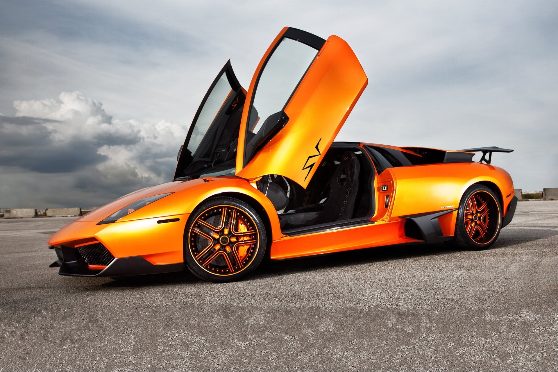 lamborghini murcielago lp670-sv orange lamborghini murcielago profil disques portes guillotine ciel nuages