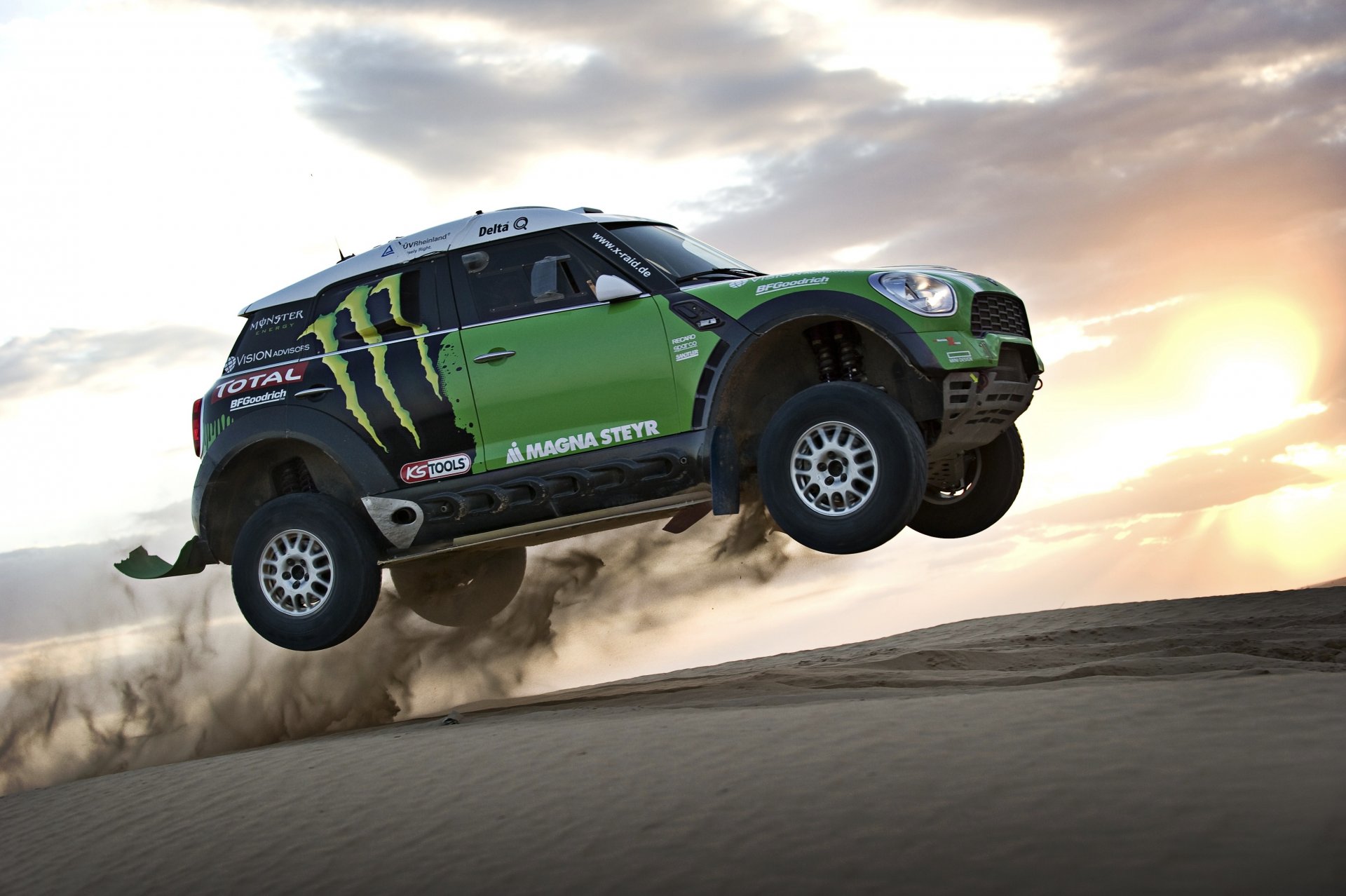 mini cooper mini mini cooper dakar rally sunset in the air race sky sun sand suv car auto green wheels body side view sport