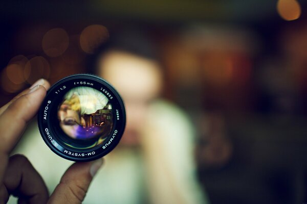 Reflection in a lens with a blurred background