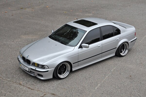 Classic grey BMW on asphalt