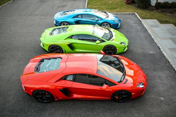 Lamborghini in the parking lot 3 different colors