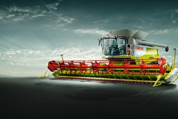 Moissonneuse lexion 770 avant le lever du soleil