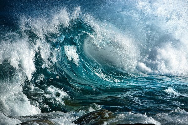 A storm creating splashes at the rocks