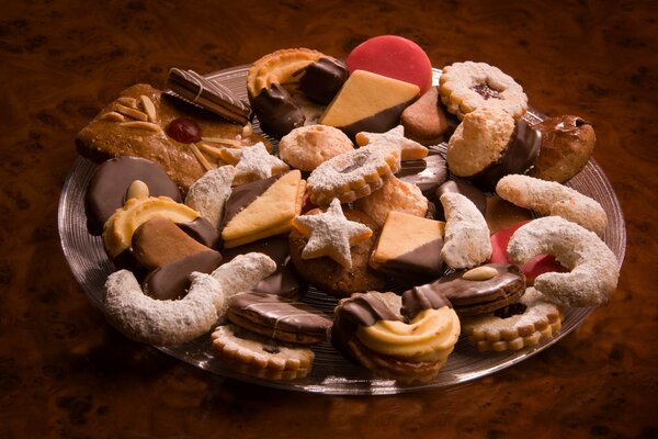 Beautiful crumbly and chocolate cookies on an iron platter