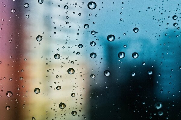 Texture colorée de gouttelettes d eau sur le verre