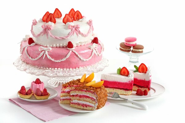 Sweet pink-white cake decorated with strawberries