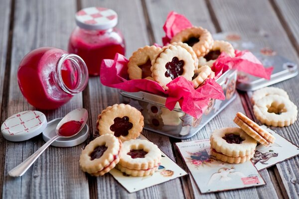 Cookies with jam in a jar with decoration