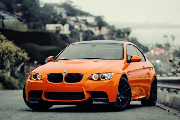 A chic BMW in the color of a juicy orange