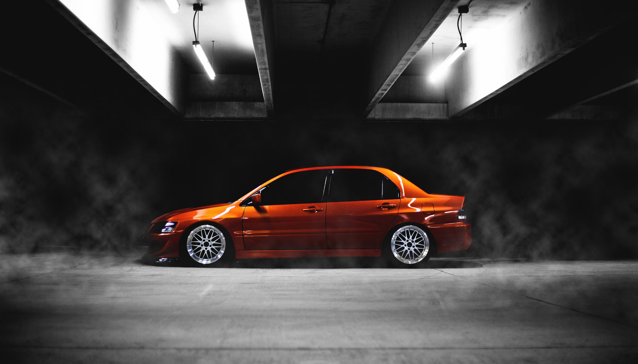 mitshubishi lancer evolution ix evo low orange tuning on the side