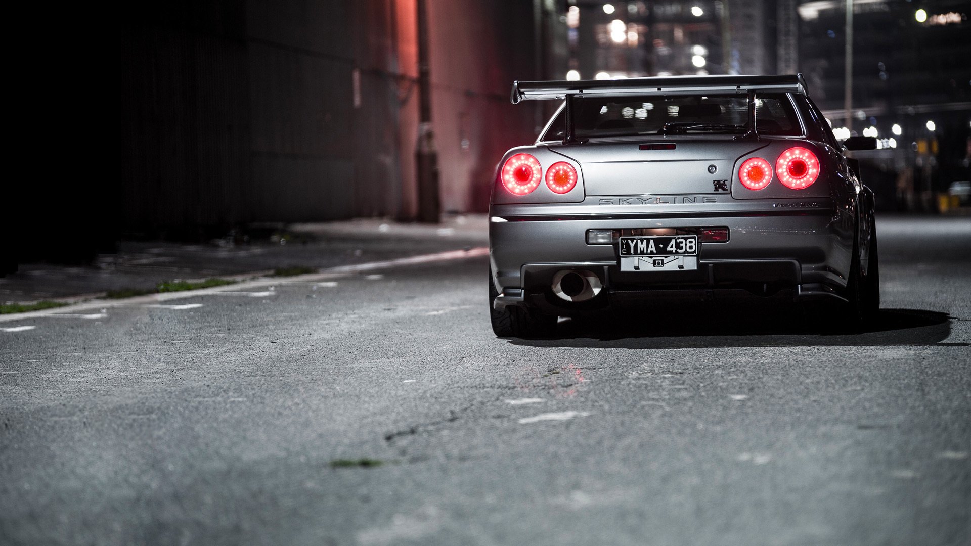 nissan skyline r34 organisches metall gasse nacht lichter