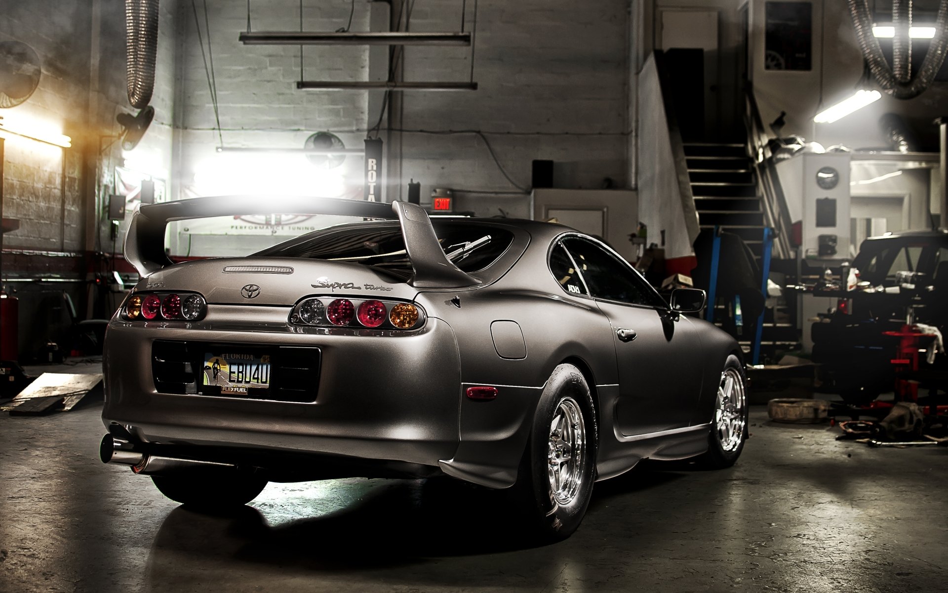 toyota above toyota supra sports car gray rear view tuning rims garage