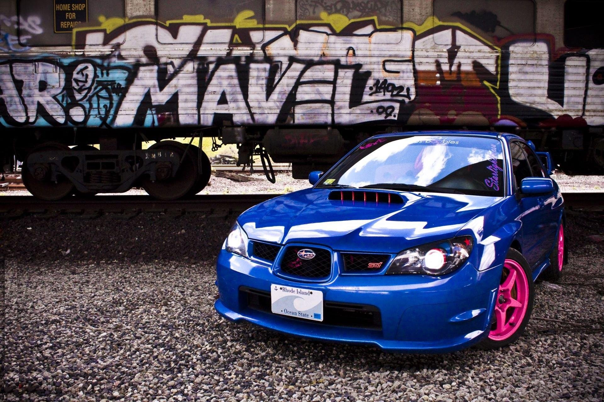 ubaru impreza blue drives pink car graffiti steel road tuning