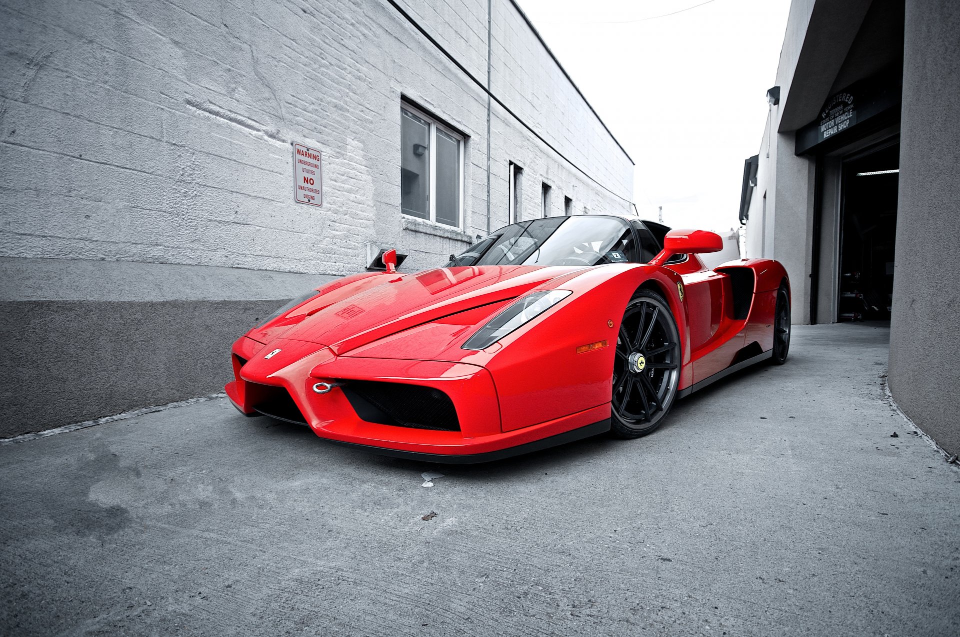 ferrari enzo red.side street ferrari red front view alley building windows sky