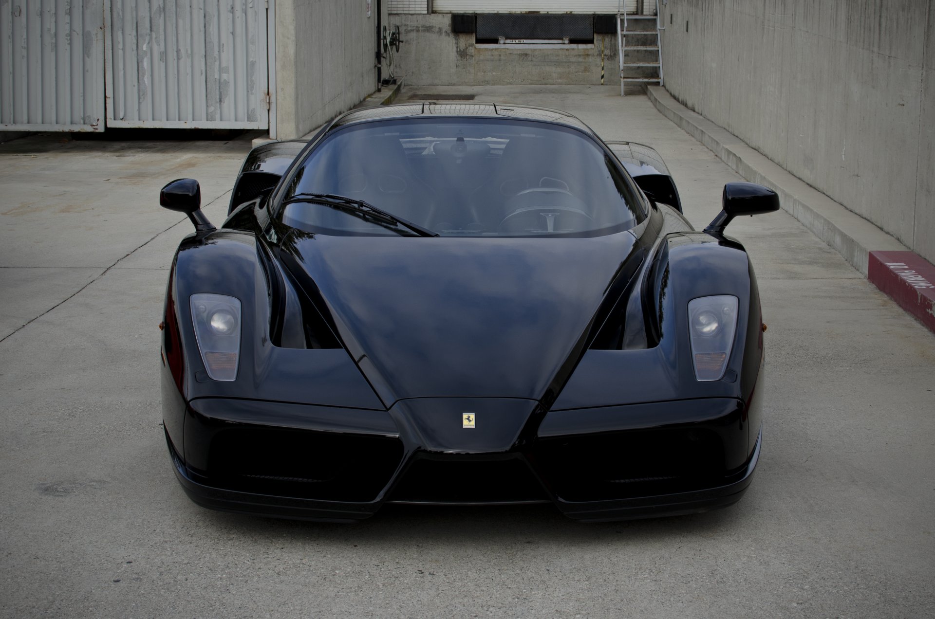 ferrari enzo black ferrari front curb wall