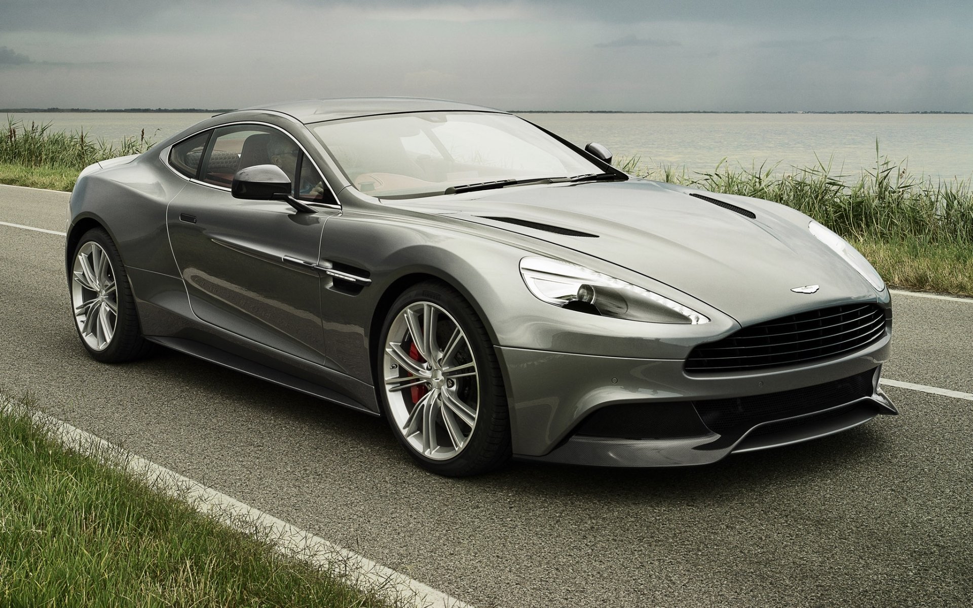 aston martin am 310 vanquish астон мартин ванкуиш суперкар передок дорога небо