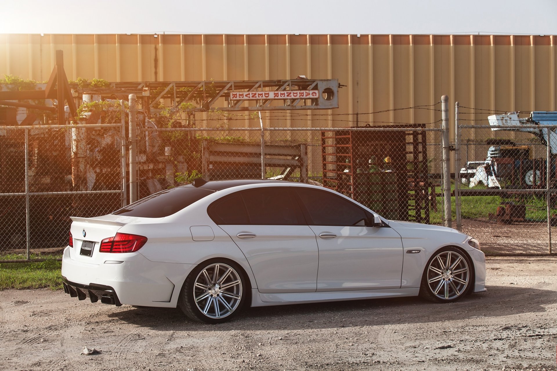 bmw 550i f10 white bmw side view tuning fence shade