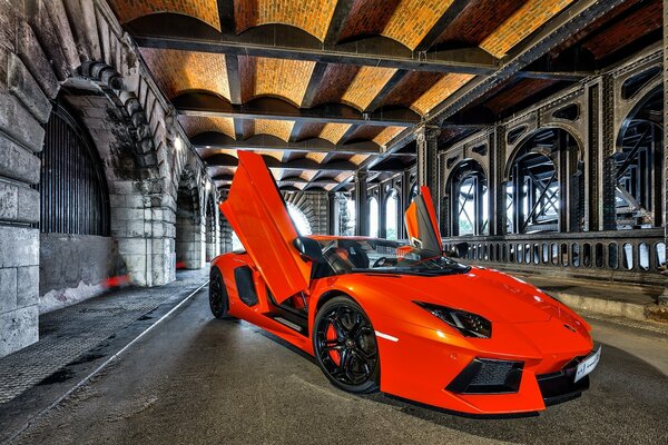 Red Lamborghini with open doors