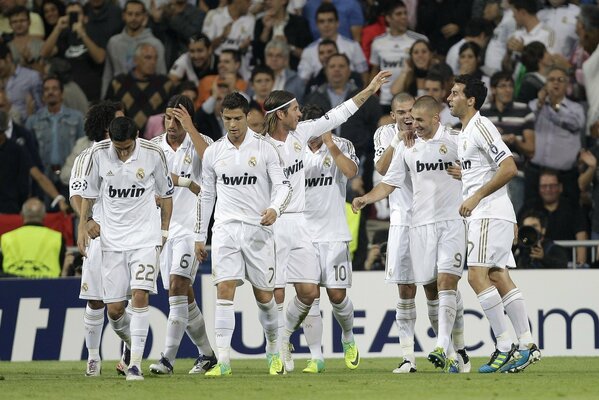 The football team rejoices at the victory