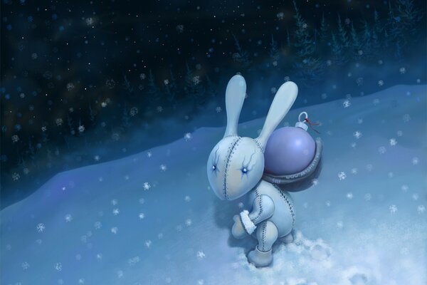 A sewn-up bunny with a New Year s toy walks in the snow