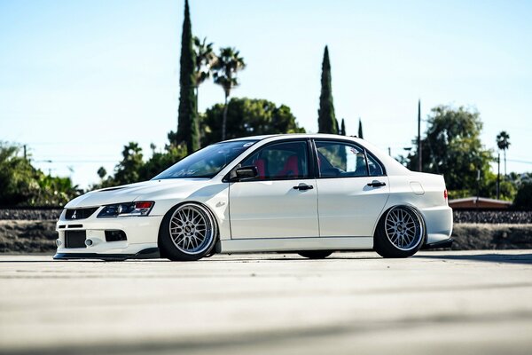 White Mitsubishi Lancer sports tuning car