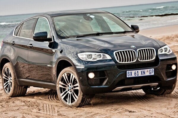 Sand on the beach is not a hindrance for BMW