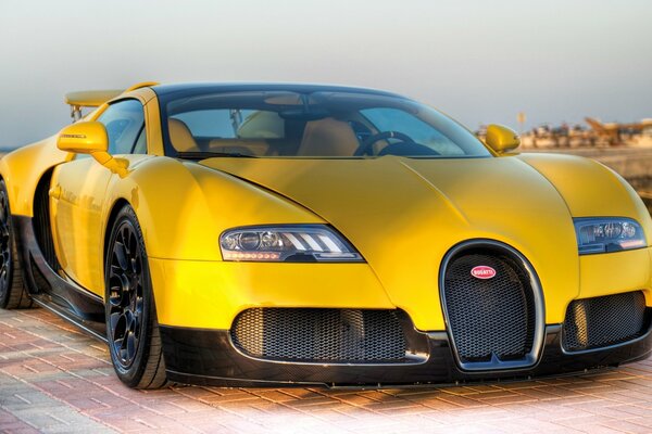 Żółta Bugatti z odlewanymi czarnymi tarczami