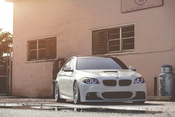 White BMW in an urban environment