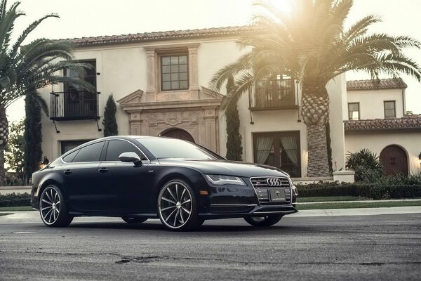 Audi a7 in the photo of a cool cottage
