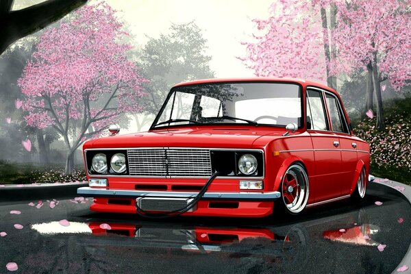 Auto rossa sulla strada tra i Sakura