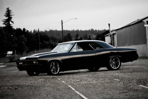 Black chevrole ss 1967 on the road