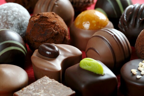 Dessert - candies of different shapes from different varieties of chocolate