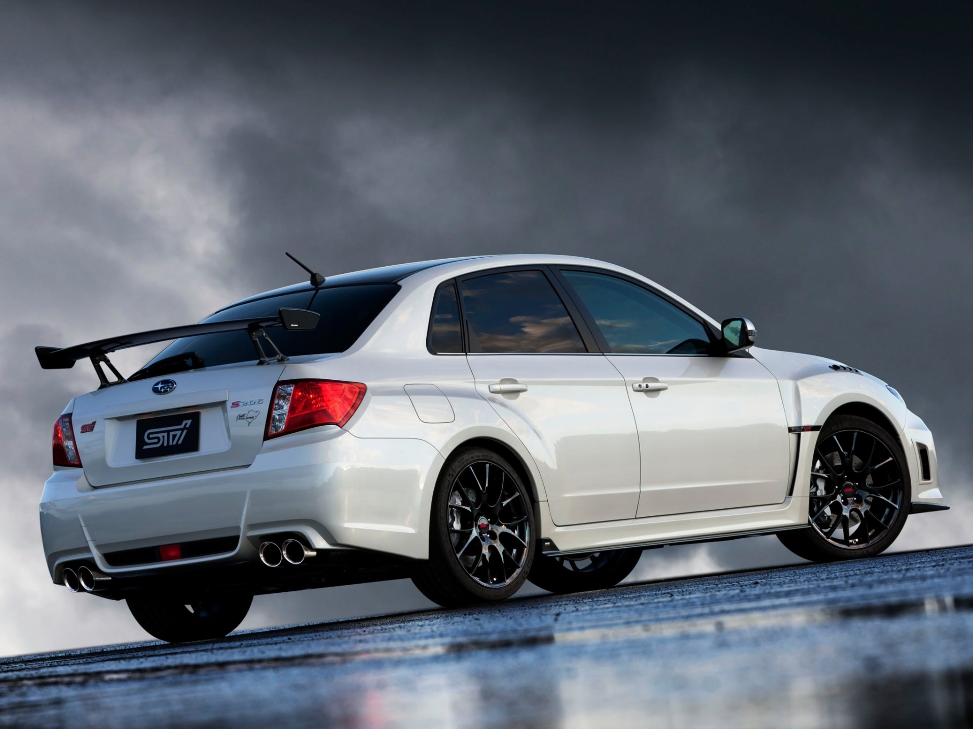 ubaru impreza wrx sti s206 nbr défi pack subaru impreza berline tuning blanc vue arrière spoiler aile