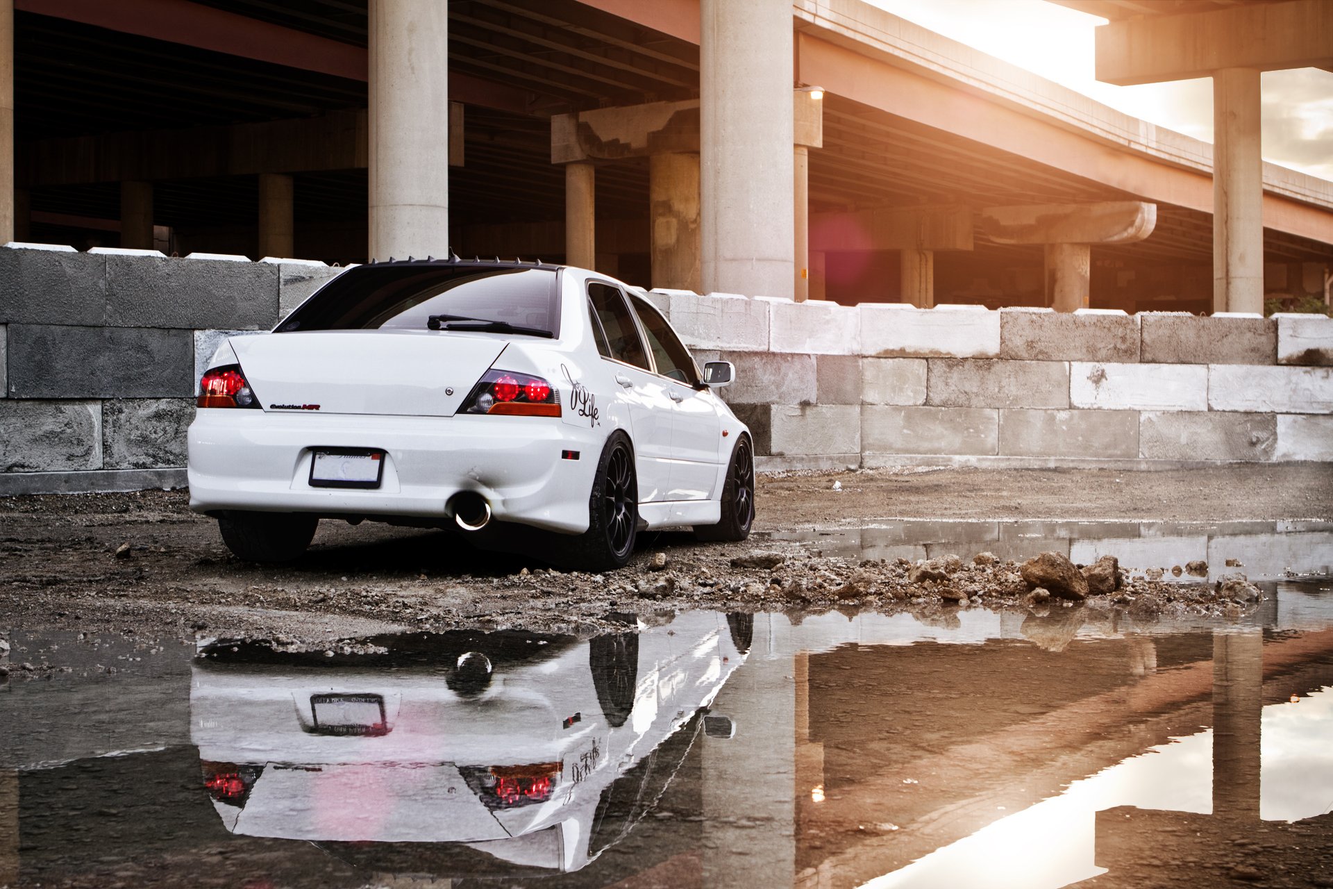 mitsubishi professions evolution evo mitsubishi lancer white construction site puddle reflection