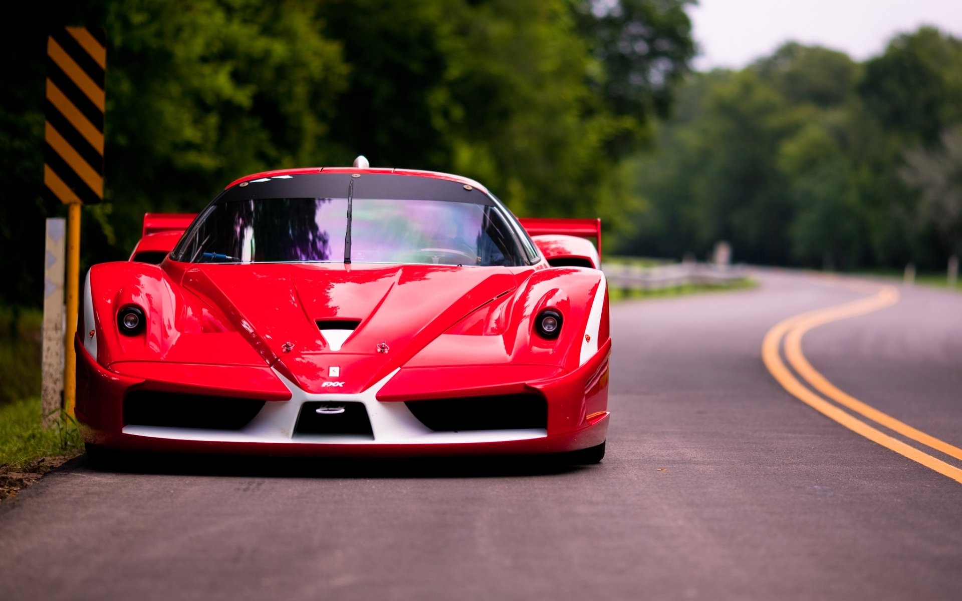 ferrari fxx evoluzione ferrari supercar red front road