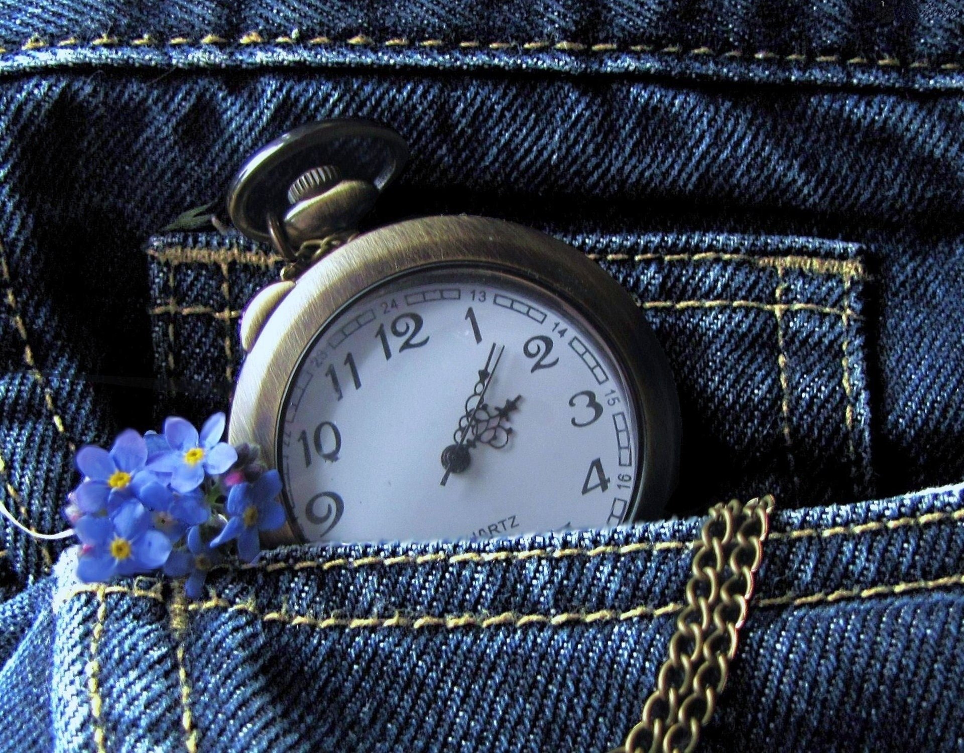 fleurs montre chaîne poche jeans