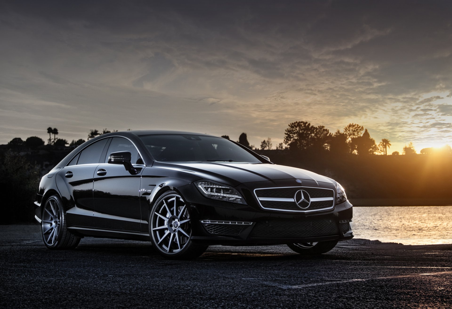 mercedes-benz cls-klasse w218 cls 63 amg schwarz vorne mercedes benz sonnenuntergang sonne blendung