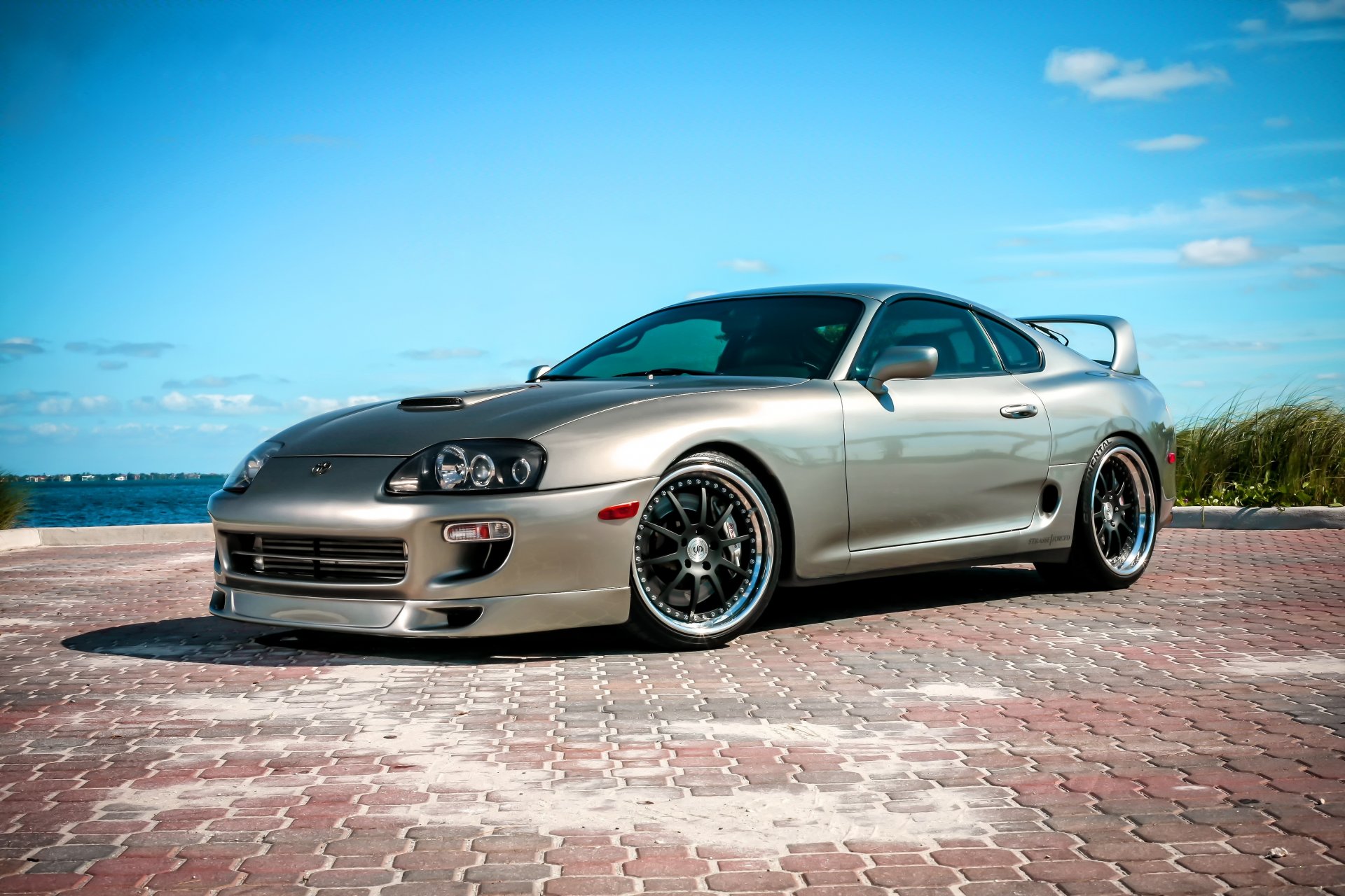 toyota above toyota supra paving stones sky cloud