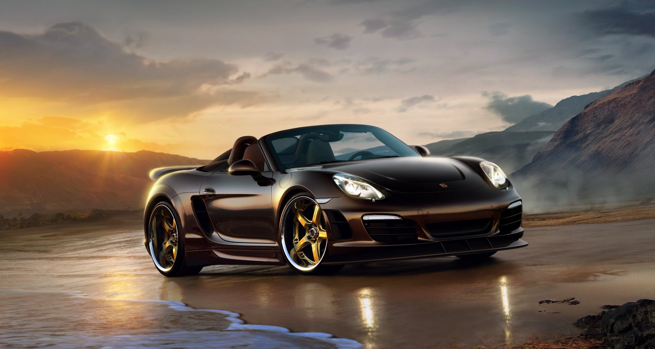 porsche boxster riva mare rocce tramonto convertibile