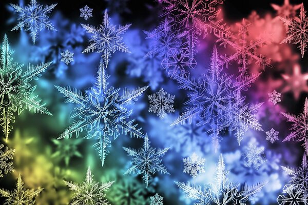 Flocons de neige d hiver sur une fenêtre gelée