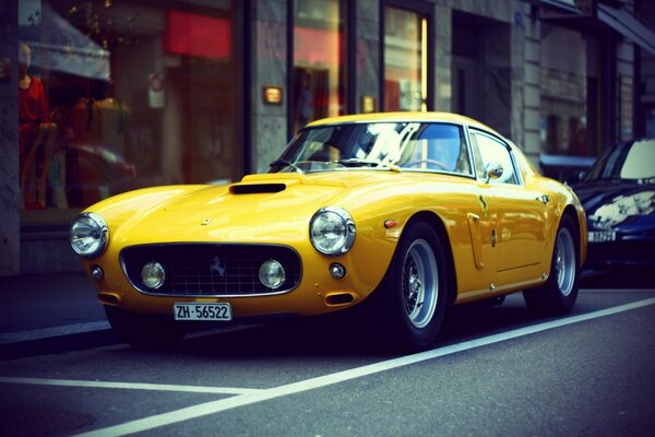 Bright yellow Ferrari on the streets of the city