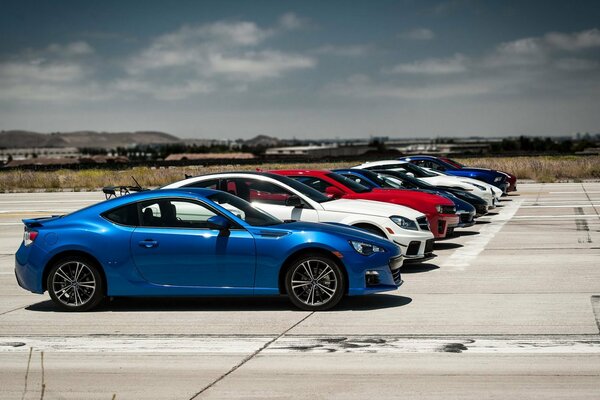 Superdeportivos coches de carreras muchos en una foto