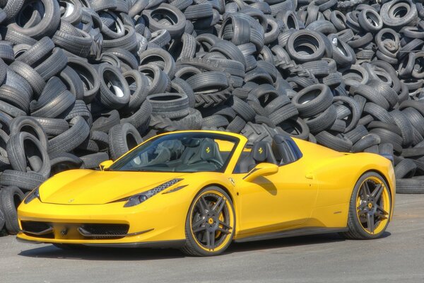 Ferrari novitec rosso on the background of tires