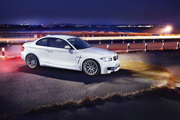 White bmw on an evening background