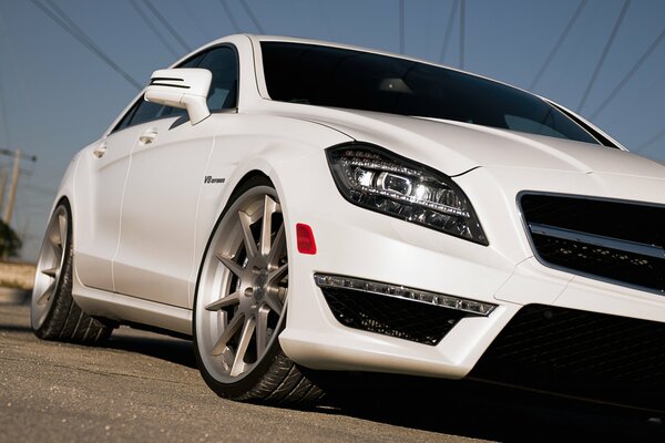 Huge white Mercedes on the highway