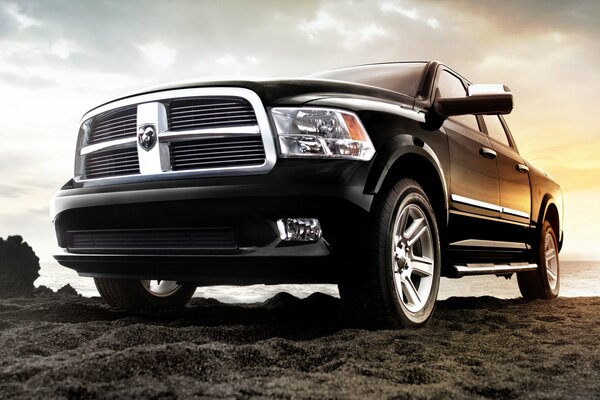 JEEP Laramie limited SUV on the sand