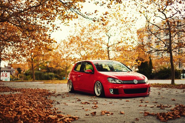Red VW Golf in autumn in Germany