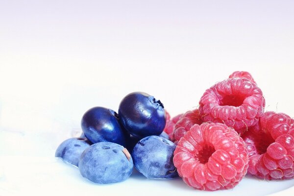 Blueberries and juicy raspberries